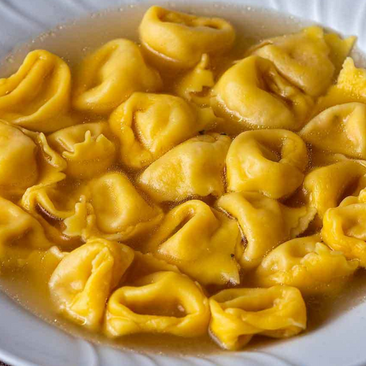 Meat tortellini with broth